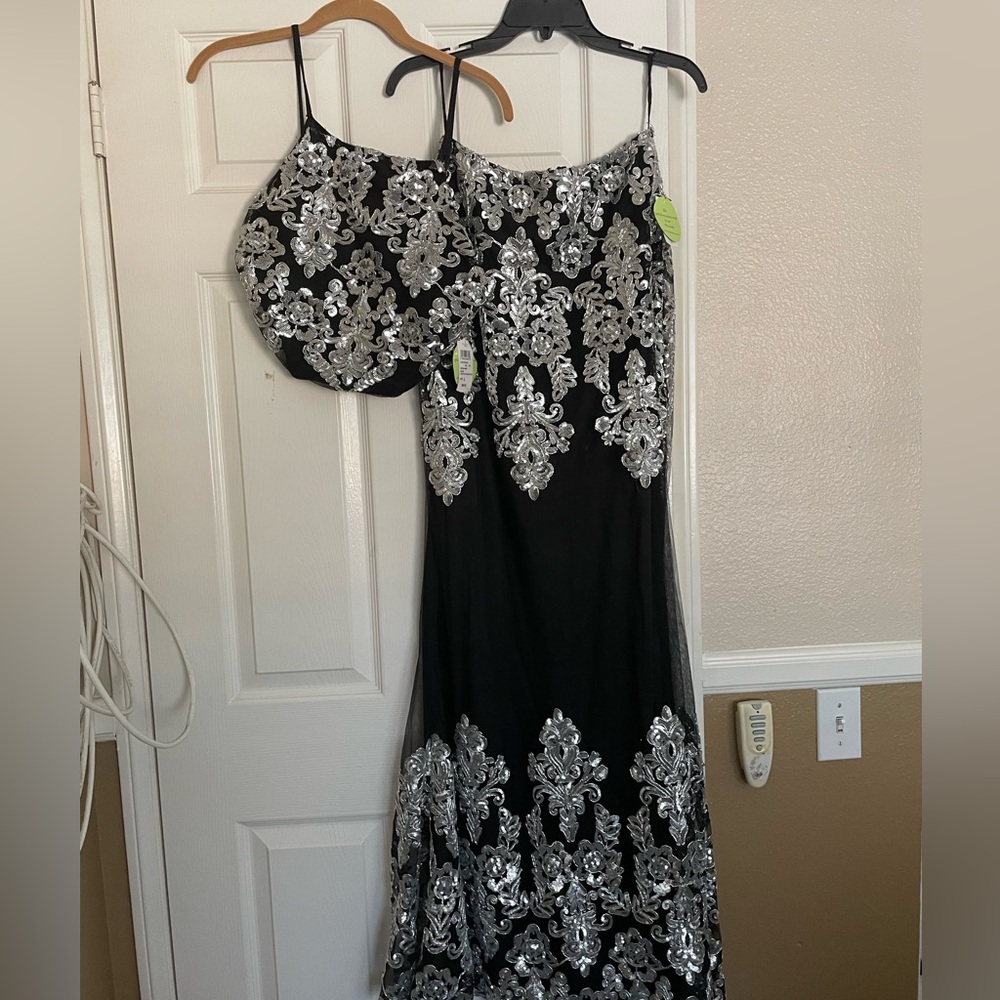 Brand new with tags, two piece outfit, top and long skirt mermaid style